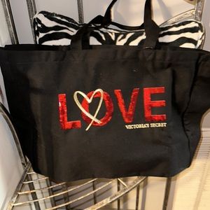 NWT Victoria's Secret black travel bag with red and gold love on front huge siz